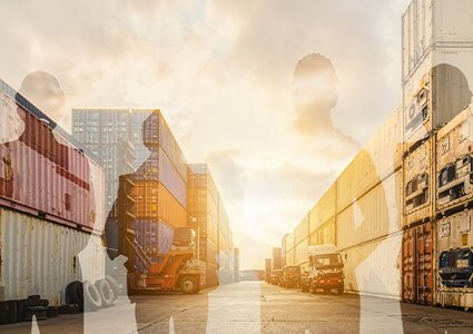 silhouettes of dock workers in a container port