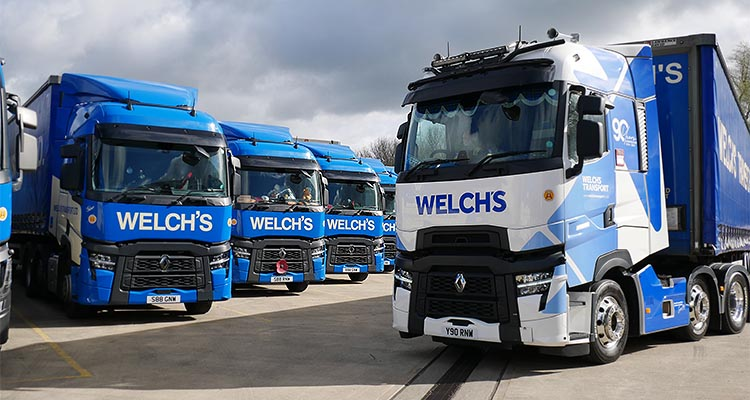 Four Welch's trucks