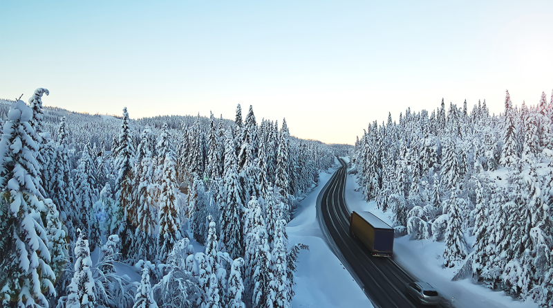 Lorry driving through snowy Alaska wilderness to support supply chain challenges article