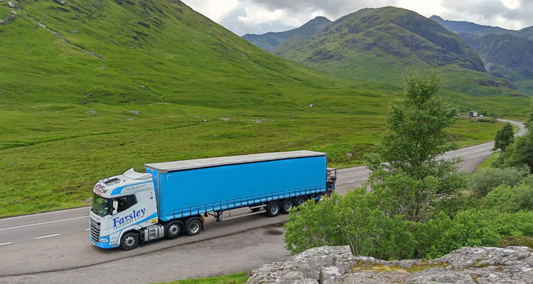 Farsley truck in green mountainous area