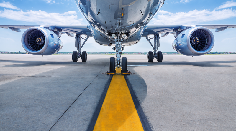 Bottom of a plane on the runway to support aviation industry article