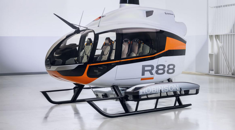 The Robinson orange, white and black R88 Helicopter