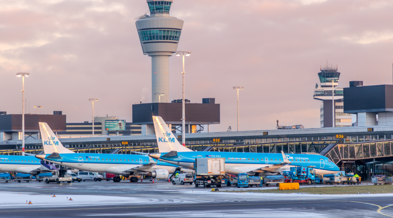 Schiphol airport with planes outside to support sustainable airport article