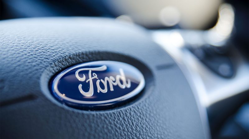 Ford issues recall for 700,000 SUVs linked to engine fire danger Ford logo on steering wheel in car to support recalls article