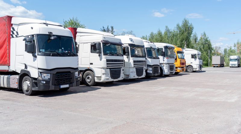 House bill funds $200M for truck priorities in parking, training and supply chain reform Row of trucks parked in parking spaces