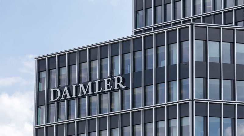 Daimler and Toyota redraw Japan’s truck industry with factory exit Daimler Truck and Toyota logos with a background of a Japanese truck factory, representing a strategic merger in the commercial vehicle industry.