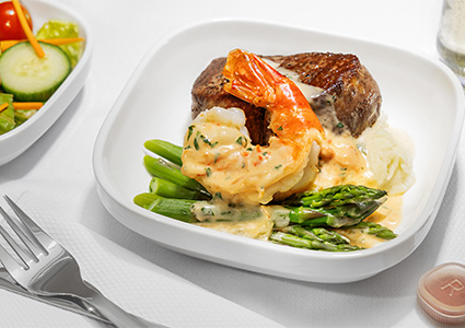 a Steak Oscar, featuring a high-quality steak topped with seafood