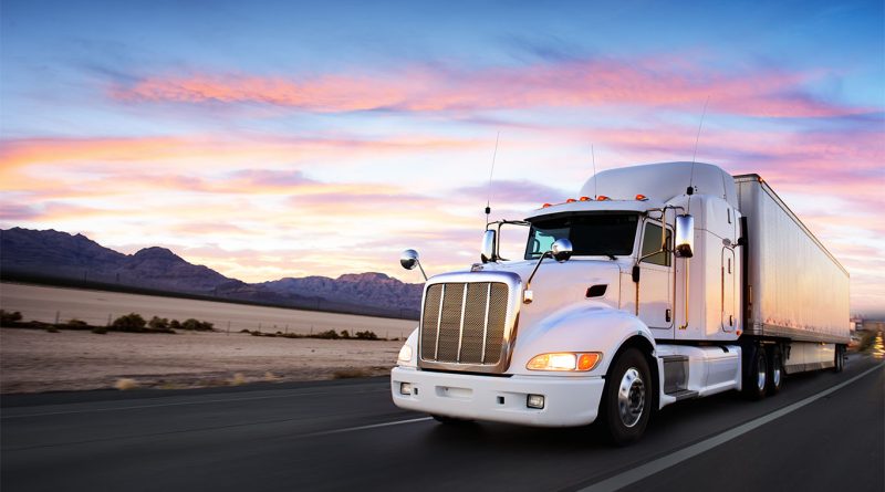 New Class 8 heavy duty trucks prepared for delivery as North American fleet orders surge in February.