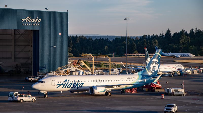 Alaska Airlines aircraft inside maintenance hangar at Portland