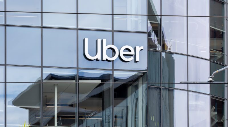 Autonomous robotaxi fleet operating in an urban environment with Uber branding