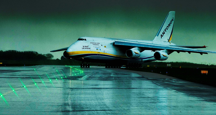 an Antonov Airlines Antonov An-124-100M Ruslan on a wet runway