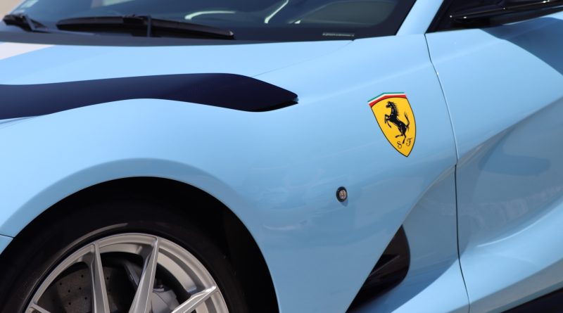Ferrari vehicle displayed to symbolize Ferrari’s EV strategy and Jony Ive collaboration.