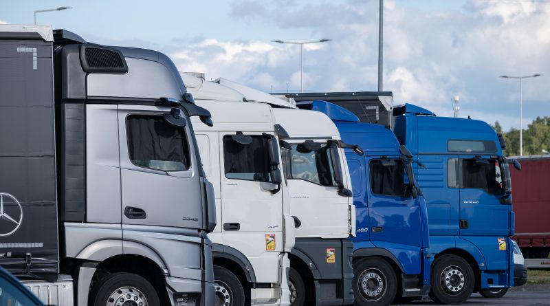Line us large trucks representing the recovery of the trucking industry as freight rates rise and capacity tightens.