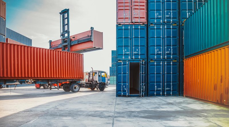 Container ships and cargo terminals handling US imports as China-origin container volumes rise amid tariff uncertainty.