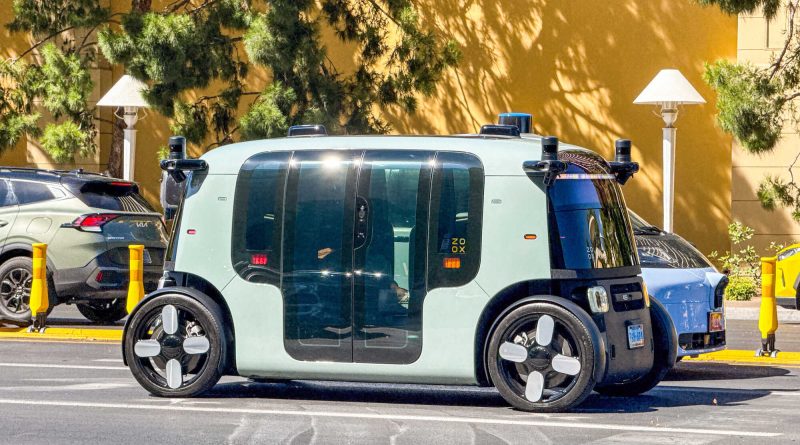 Zoox purpose-built autonomous robotaxi operating as a paid ride-hailing service in Las Vegas.